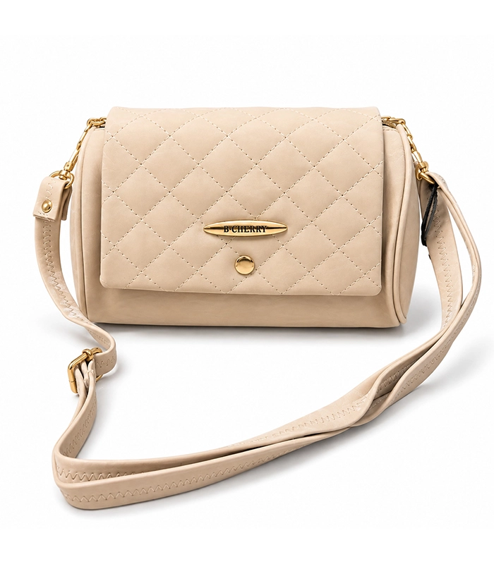 Beige quilted bag with gold-tone chain detail and adjustable strap
